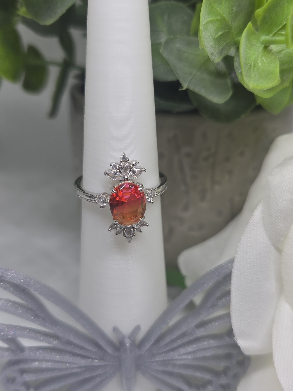 BP Ring with Orange Red Oval CZ and Accent Stones On Rhodium Plating